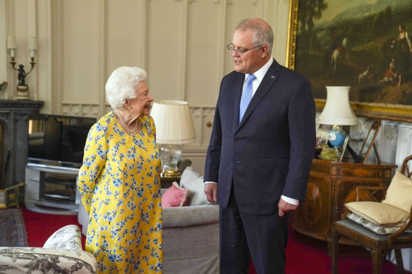 Queen Elizabeth II receives Australian Prime Minister Scott Morrison during an audience in the Oak Room at Windsor Castle.