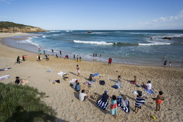 Swimmers and sunbakers were keeping their spacing at Sorrento.