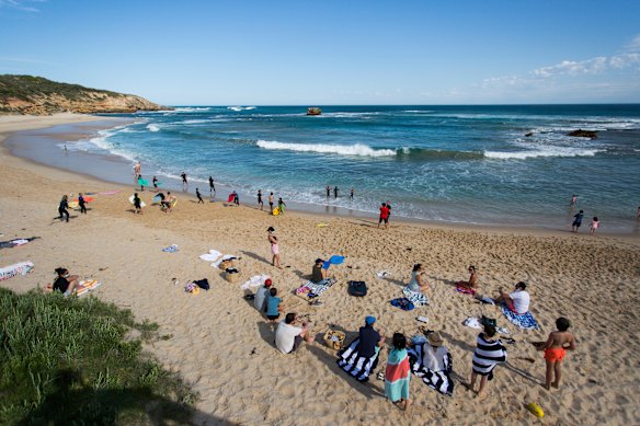 Swimmers and sunbakers were keeping their spacing at Sorrento.