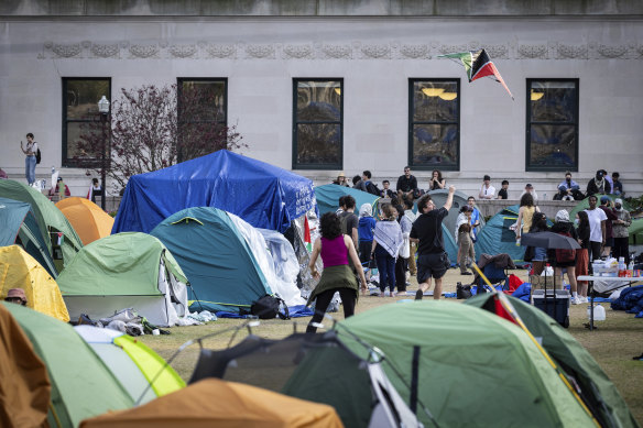 A student protester flies a kite inside the protest encampment on the Columbia University campus.