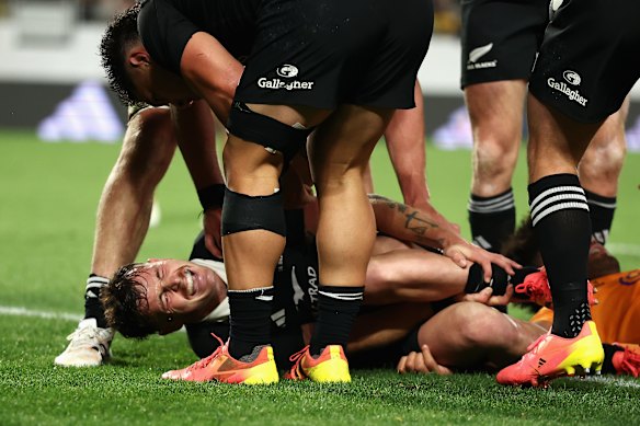Carter in pain after scoring.