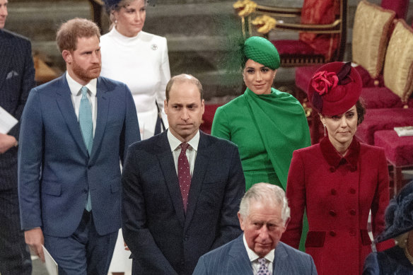 Prince Harry and Meghan Duchess of Sussex, Prince William and Kate, Duchess of Cambridge, with Prince Charles, front, at Westminster Abbey in London in March 2020. 