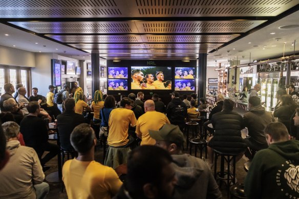 Fans watch the World Cup match between France and Australia at the Coogee Bay Hotel.