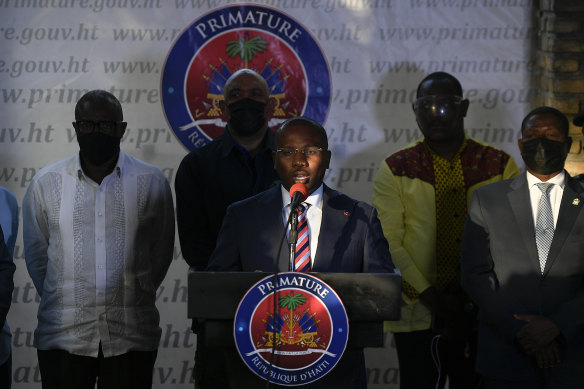 Interim President Claude Joseph speaks during a news conference at his residence in Port-au-Prince, Haiti, four days after the assassination of Haitian President Jovenel Moise.