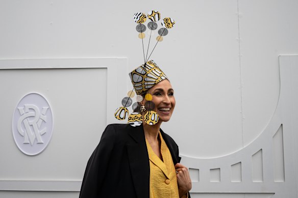 Diana Nadebaum wearing a hat by Peacock Millinery.