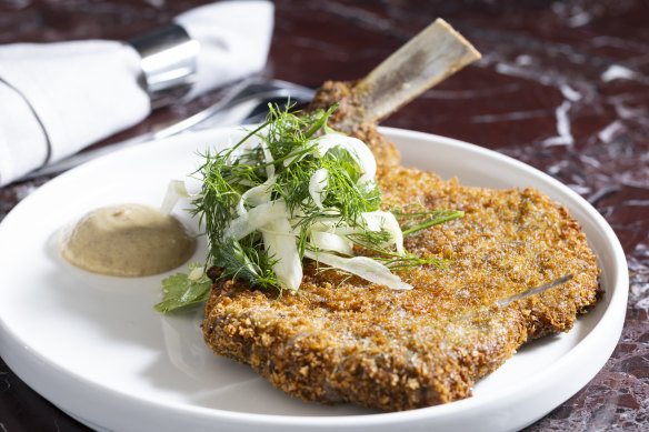 Veal cotoletta is crunchy and delicious.