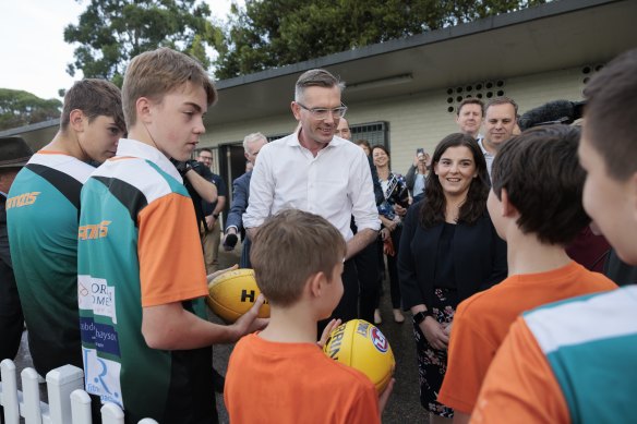 NSW Premier Dominic Perrottet in Concord with Liberal candidate Stephanie Di Pasqua on Thursday.