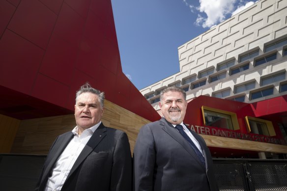 City of Greater Dandenong chief executive John Bennie and Mayor Jim Memeti stand in front of the municipal building, completed in 2014.