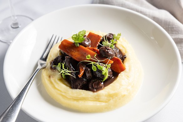 Beef Bourguignon on buttery potato puree.