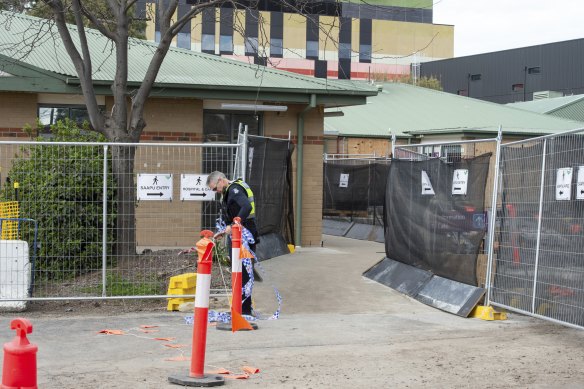 Police inspect Sunshine Hospital after it was forced into lockdown on Sunday.