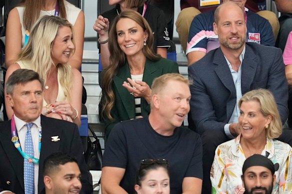 Britain’s Kate, Princess of Wales and William, Prince of Wales sit behind Chris Hoy and Sophie, Duchess of Edinburgh in the audience.