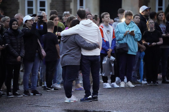 Mourners gather outside Windsor Castle.