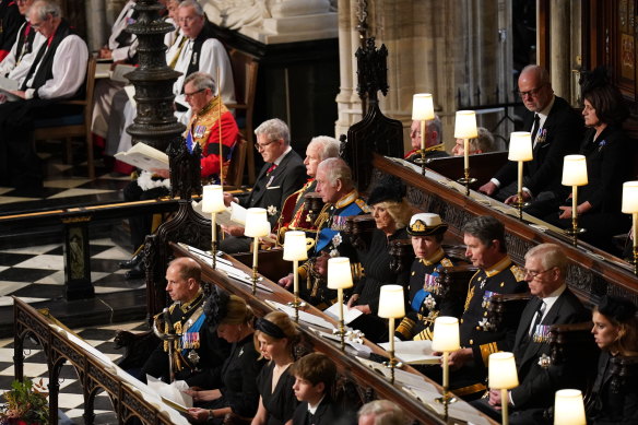 Middle row, third from left, King Charles III, Camilla, the Queen Consort, Princess Anne, Sir Tim Laurence, the Duke of York, Princess Beatrice; front row from left, Prince Edward, the Duke of Wessex, Sophie, Countess of Wessex, Lady Louise Windsor and James, Viscount Severn; top row, from left, George Windsor, the Earl of St Andrews, Sylvana Palma Windsor, the Countess of St Andrews,  attend the committal service for Britain’s Queen Elizabeth II at  St George’s Chapel.