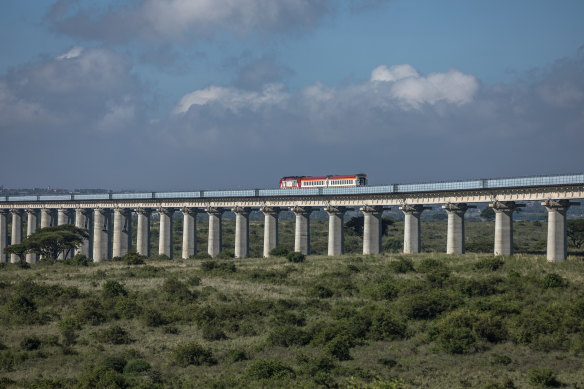 The Standard Gauge Railway, funded and built by China, inside the Nairobi National Park in Kenya.