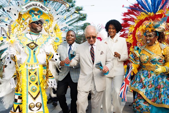 Charles shook traditional cowbells as he paraded with Junkanoo dancers in Nassau, Bahamas.