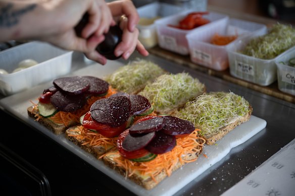 It’s all about the layers – making sandwiches at Glory Us. 