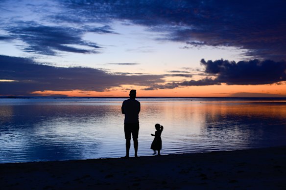 The author watching the sunset with his niece.