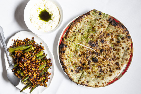 Wood-fired okra (left) and matar kulcha (pea-stuffed bread with stracciatella and burnt green onion oil).