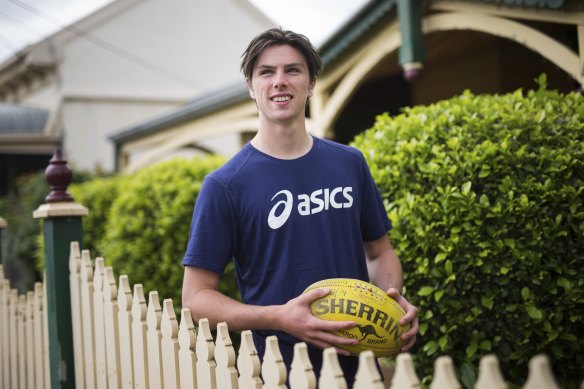 AFL draft prospect Ollie Henry is a long-time Cats fan but realises signing with Geelong isn’t a given.