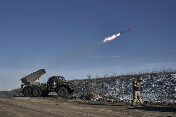 Ukrainian soldiers fire rockets at Russian positions in the frontline near Soledar, Donetsk region.