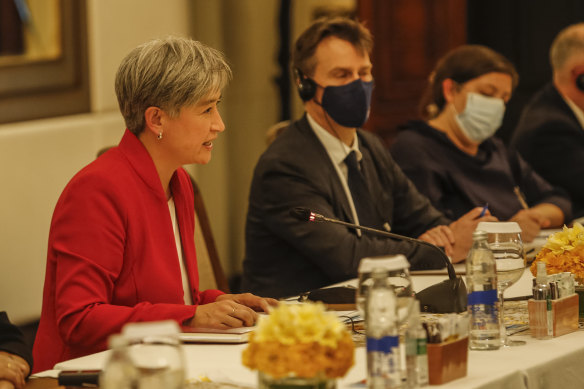 Penny Wong gives a speech to her Chinese counterpart Wang Yi at the G20 meeting in July. 