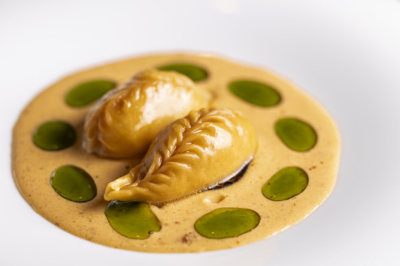 Prawn mousse-filled culurgiones in red curry.