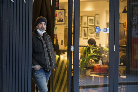 Tony Roussos, owner of The Quarter cafe in Degraves Street, Melbourne, is among the traders eagerly awaiting news on plans to reopen.