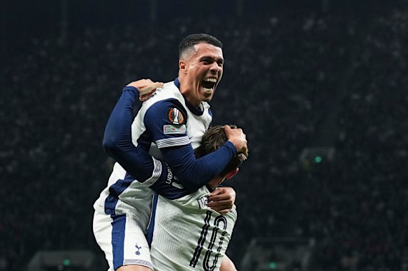 Pedro Porro celebrates his goal.