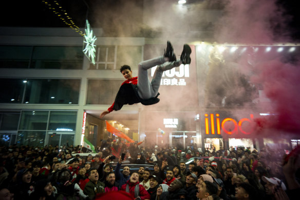 Moroccan fans celebrate in Milan.