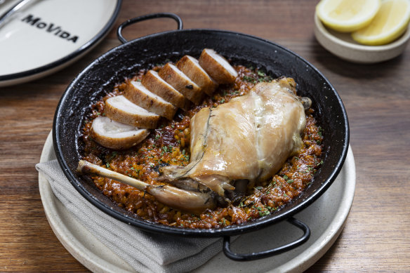 Paella with rabbit and periwinkles.