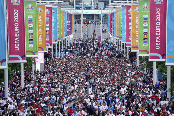 Fans file out of Wembley Stadium after England beat Germany in the round of 16 at Euro 2020. 
