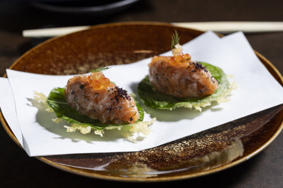 Salmon tartare with ginger oil and pickled plum: a jaunty snack.