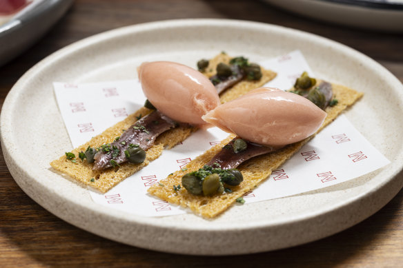 MoVida’s signature anchovy with smoked tomato sorbet.