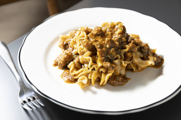 Busiate pasta with tomato pesto and bone marrow.