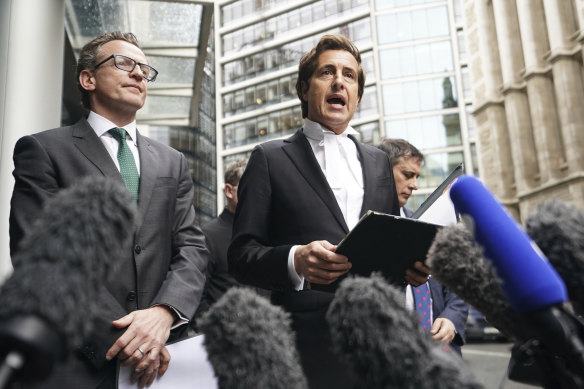 Prince Harry’s barrister, David Sherborne (right) speaking to the media outside of the Rolls Building in central London.
