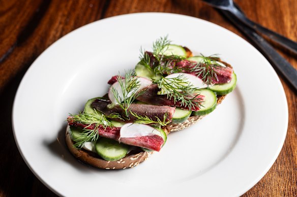 Sumac-cured sardines on challah.