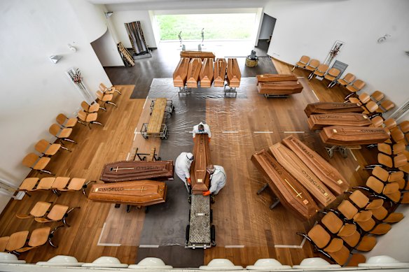 Coffins with coronavirus victims from Bergamo arrive at the Cinisello Balsamo cemetery near Milan, Italy. 