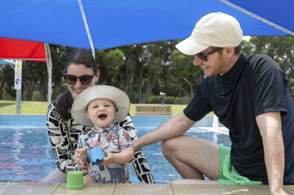 Sophie Wood and Dale Finn with their one-year-old son Paddy at the Pines Forest Aquatic Centre on Saturday. 