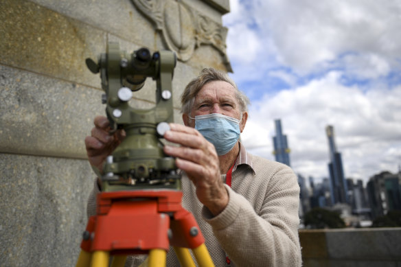 Frank Johnston tests mirror angles for the Ray of Light ceremony at the Shrine of Remembrance on November 11.