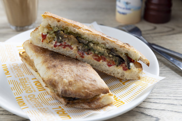Roast capsicum pide with goat’s cheese, eggplant and pesto.