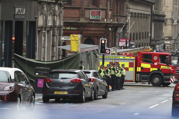 Police remain at the scene of the incident on West George Street in Glasgow.