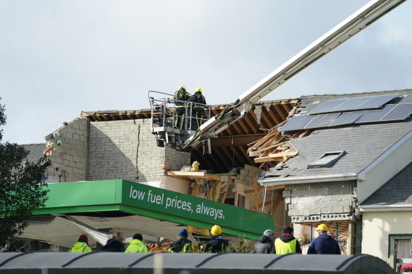 Emergency services work at the scene of an explosion at Applegreen service station in the village of Creeslough in Donegal, Ireland.