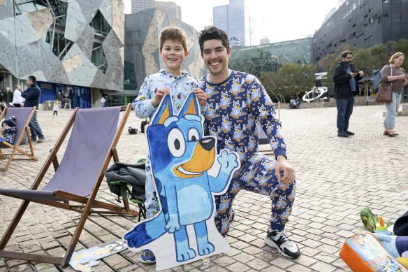 Bluey fans Hudson, 6, and dad Kyle Hartman watched the highly anticipated new episode in Melbourne’s Federation Square. 