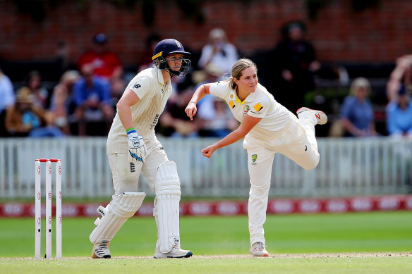 England's Heather Knight, left, and Australia's Sophie Molineux, right, in action on day three of the Women's Ashes Test. 