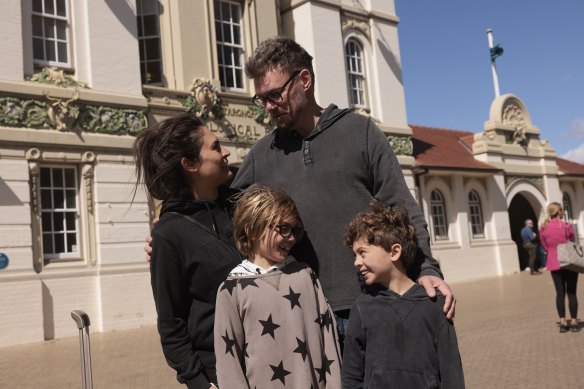 The Perri family leave the zoo on Wednesday morning after their evacuation.