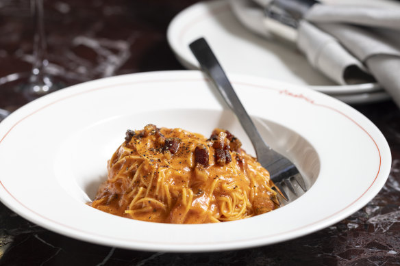 Amatriciana (angel hair pasta with crushed tomato and guanciale).