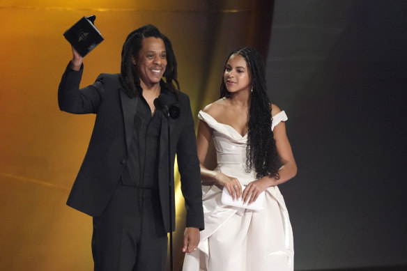 Jay-Z accepts the Dr. Dre global impact award with daughter Blue Ivy Carter.