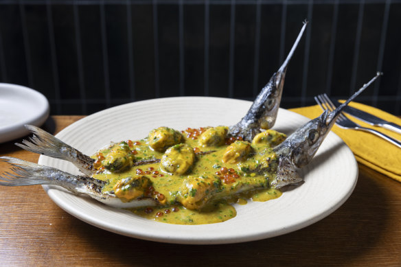The seafood platter supplement (market fish, mussels, salmon caviar and lemon-pickle-spiked butter sauce).