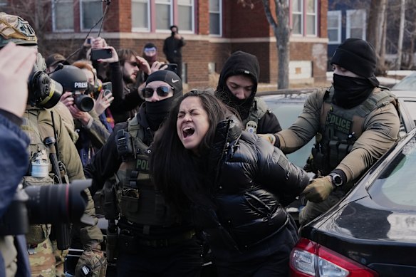 Aliya Rahman is detained by federal agents near the scene where Renee Good was fatally shot by an ICE officer.