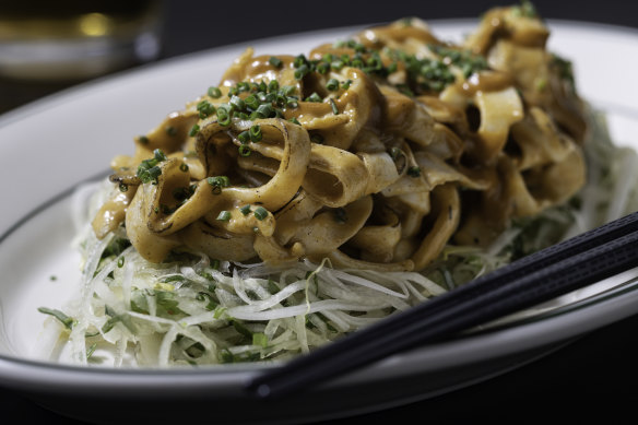 Go-to dish: Grilled noodles made from squid atop a bed of green papaya salad.